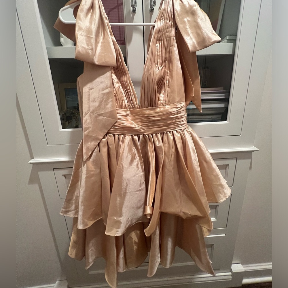 Gold Mac Duggal mini dress with bows on sleeves